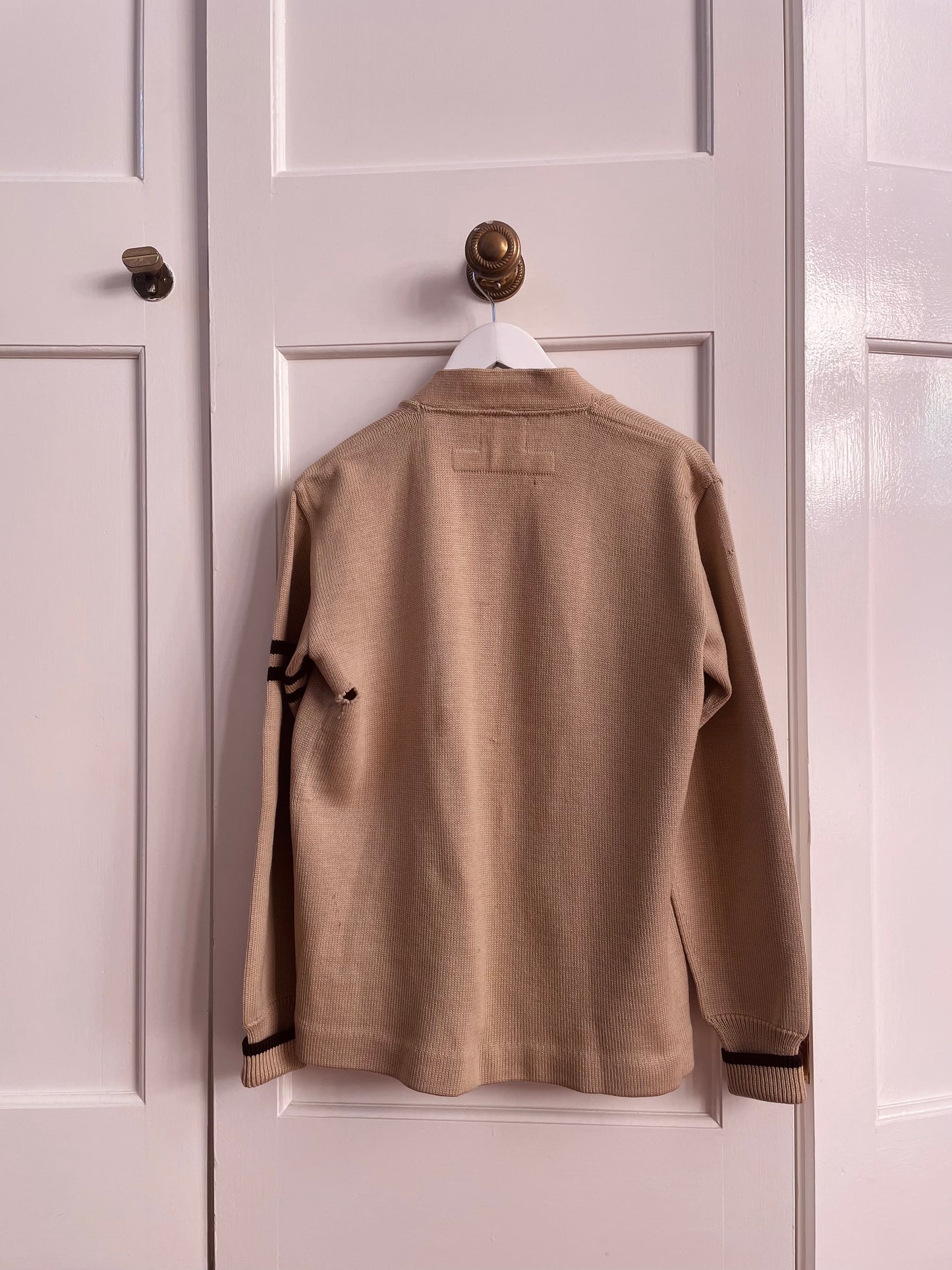 Backside of tan 1959 varsity letterman sweater